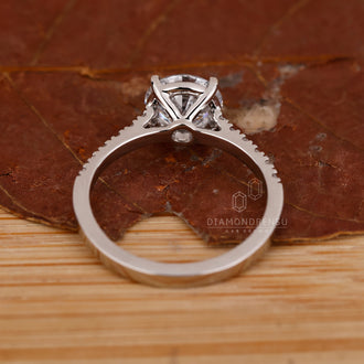 Handmade jewelry piece with custom round diamond setting.
