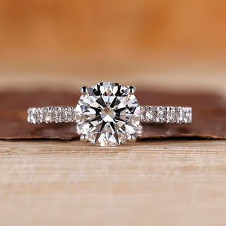 White gold round diamond ring with a classic 4 prong setting.
