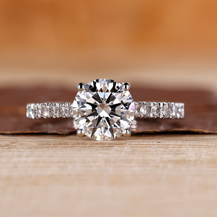 White gold round diamond ring with a classic 4 prong setting.
