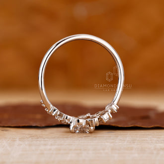 Round And Marquise Diamoand Ring In Bypass Setting