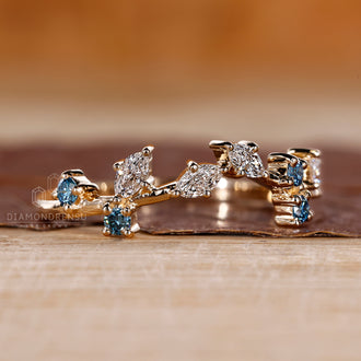 Cluster wedding band with a prong setting for the stones.
