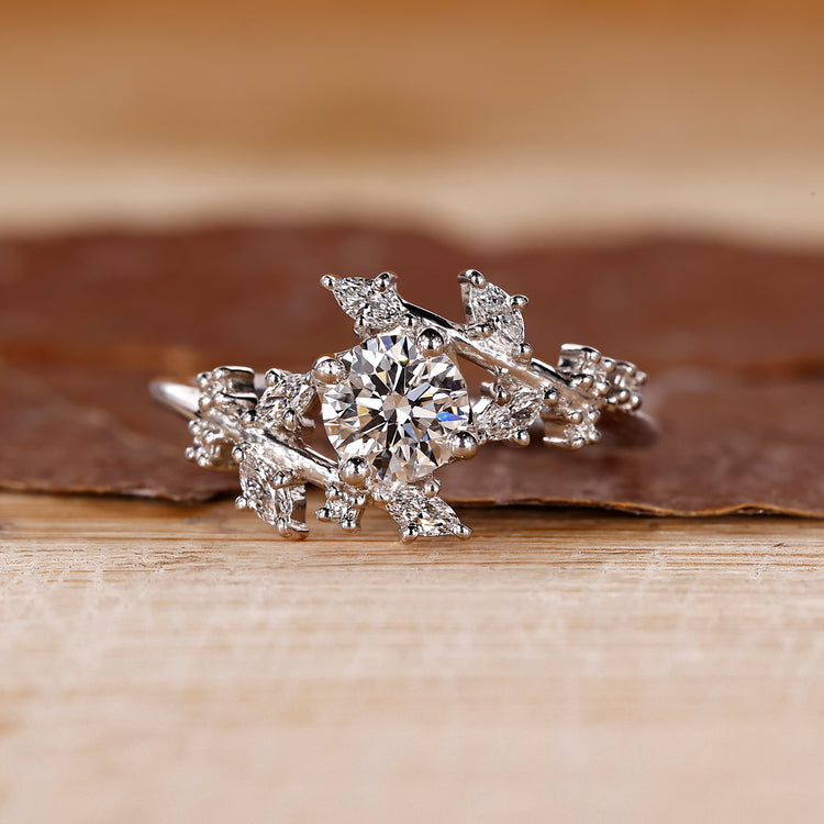 Round And Marquise Diamoand Ring In Bypass Setting