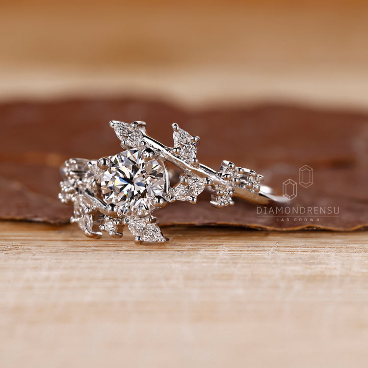 Round And Marquise Diamoand Ring In Bypass Setting