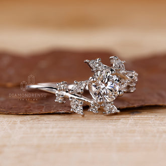 Round And Marquise Diamoand Ring In Bypass Setting