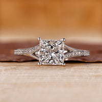 Princess cut engagement ring with cathedral setting.
