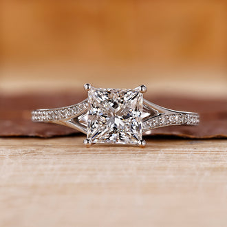 Princess cut engagement ring with cathedral setting.
