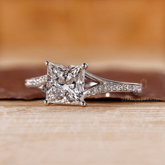 Cathedral ring setting with princess cut diamond.
