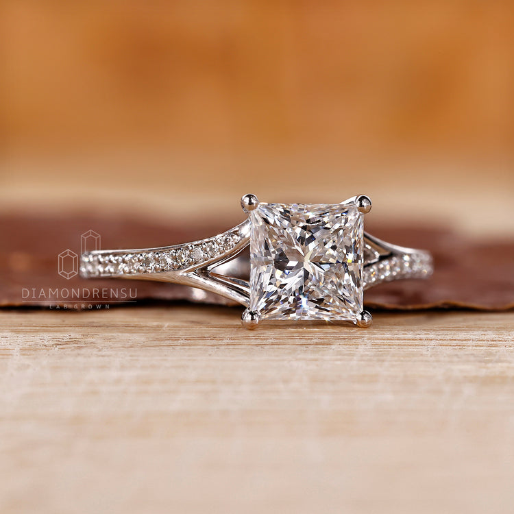 Custom princess cut engagement ring in white gold with 4 prong setting.
