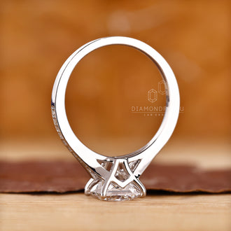 IGI certified round cut engagement ring with cathedral setting.
