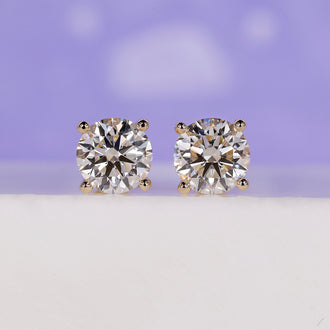 Elegant 3 carat diamond earrings with stunning brilliance.
