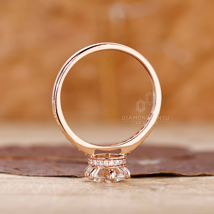 A custom engagement ring with a round diamond
