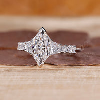 Princess cut diamond ring with shared prong setting
