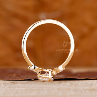 IGI certified handmade ring featuring pear center diamond and side diamonds.
