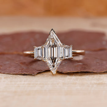 3 stone ring with unique design and beautiful craftsmanship.
