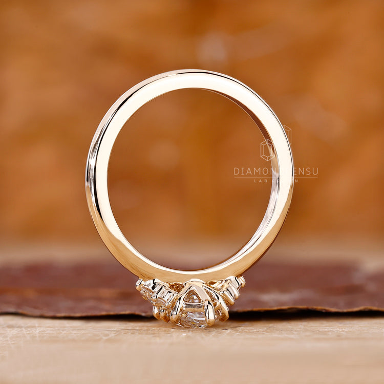 Diamondrensu marquise ring with clean, polished band.
