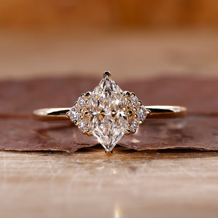 Dutch marquise engagement ring in yellow gold with solitaire setting.
