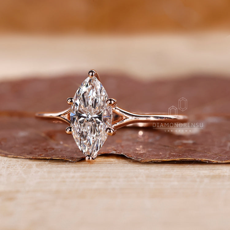 Split shank engagement ring with handmade details.
