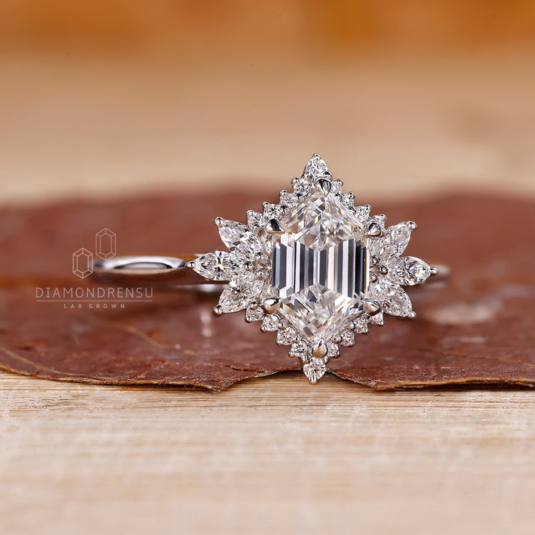 Hexagon engagement ring with white gold setting.
