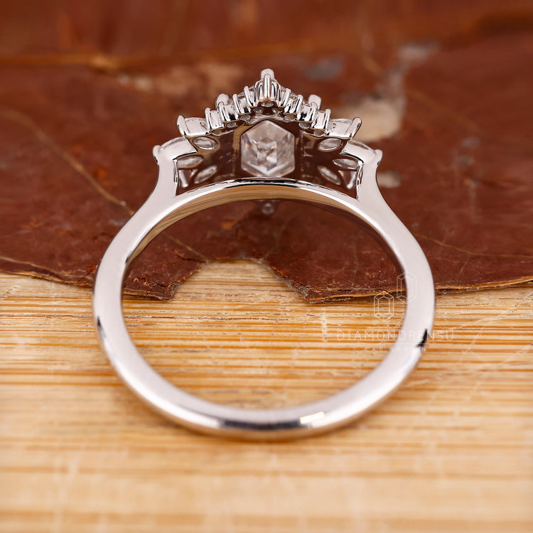 Handmade round engagement ring by Diamondrensu.
