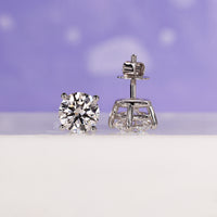 3 carat diamond studs crafted in white gold, adding brilliance to any look.
