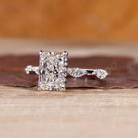 Marquise cut distance pave with radiant cut diamond in custom design.
