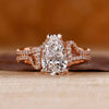Pear cut diamond ring with pave setting ring.
