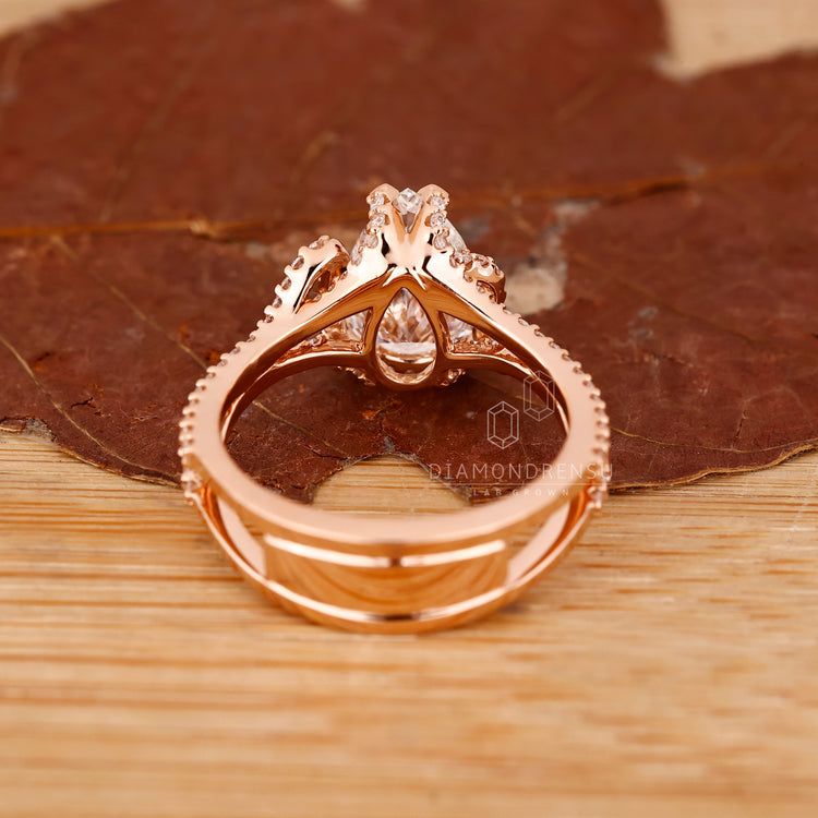 Four tap prong with hidden halo engagement ring.
