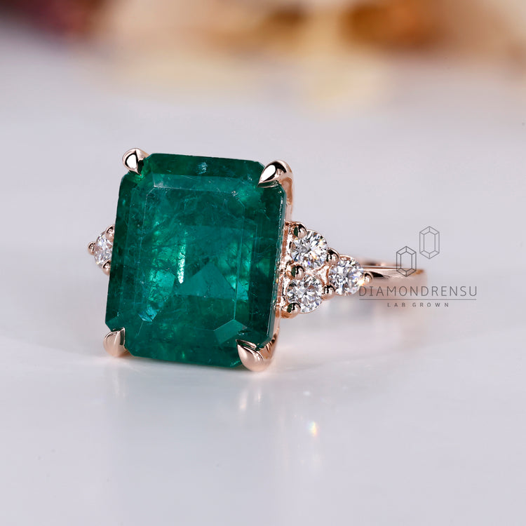Handmade emerald gemstone engagement ring.
