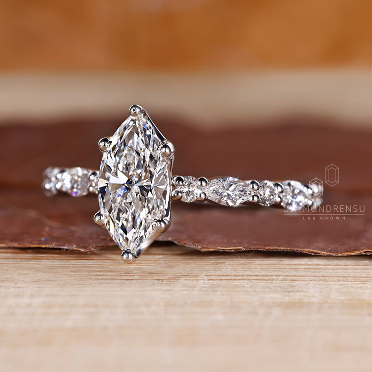 White gold engagement ring with handmade design.
