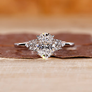 Oval Diamond Engagement Ring with a unique design in white gold.
