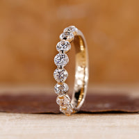 Yellow gold band with a smooth, polished finish.
