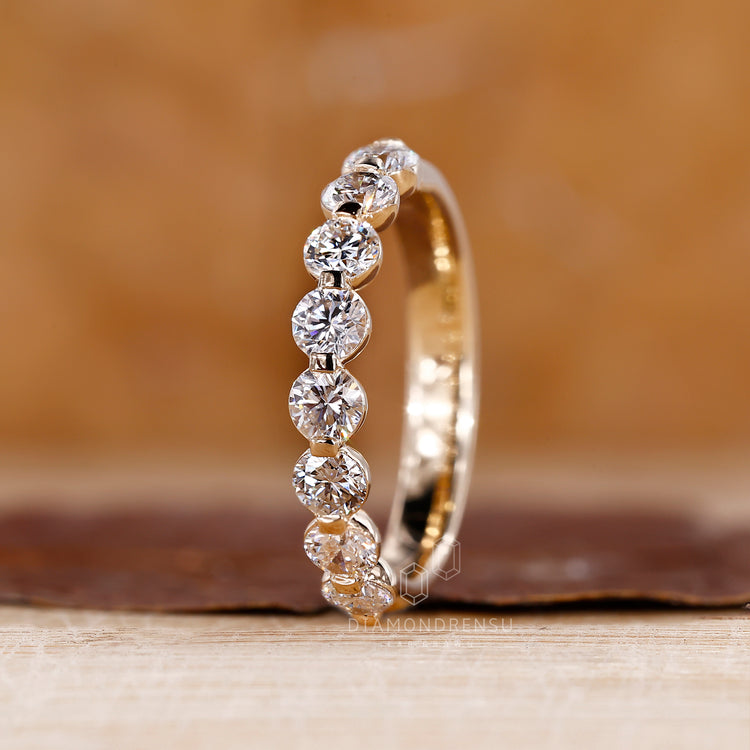 Yellow gold band with a smooth, polished finish.
