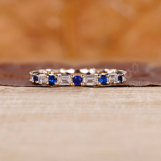 Yellow gold wedding band with diamonds.
