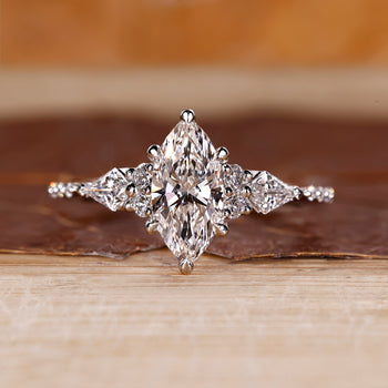 Marquise shaped diamond ring with white gold band.
