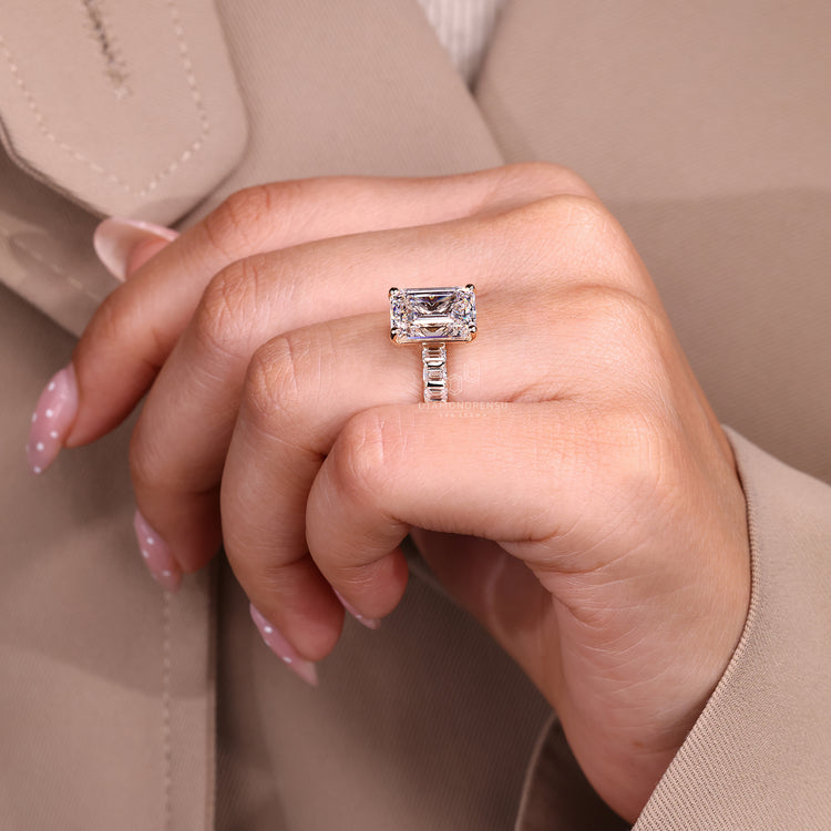 5 carat emerald cut diamond ring in pave bar setting.
