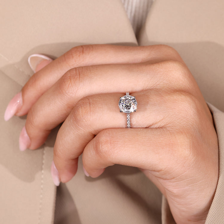 Portuguese cut ring with pave band and lab grown diamond centerpiece.