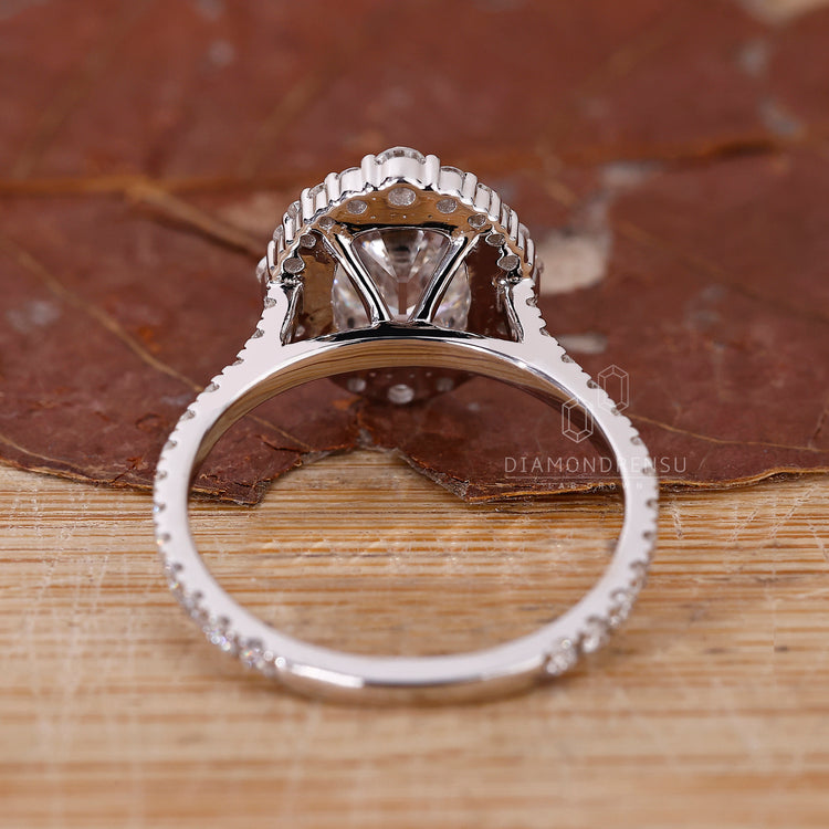 Halo engagement ring with cushion old mine diamond by Diamondrensu.
