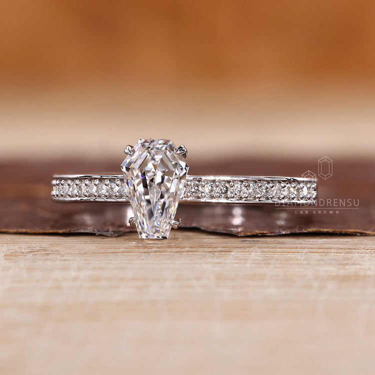 IGI certified coffin cut diamond ring with heart shape prong setting.