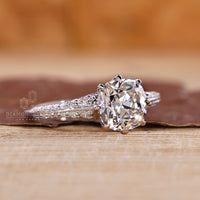 Lab grown cushion old european diamond ring with knife edge band.
