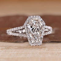 IGI certified coffin cut diamond ring with cathedral setting.