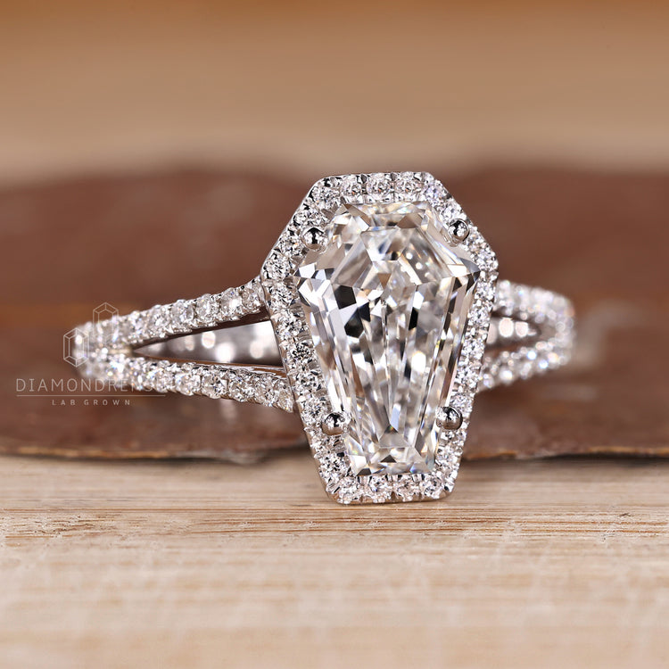 IGI certified coffin cut diamond ring with cathedral setting.