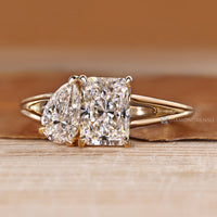 Toi et Moi style highlights the pear and radiant stones.