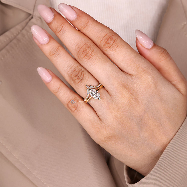 Dutch marquise ring with round diamond halo