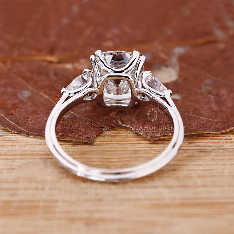 Cushion old mine cut diamond ring with pear sides by Diamondrensu.
