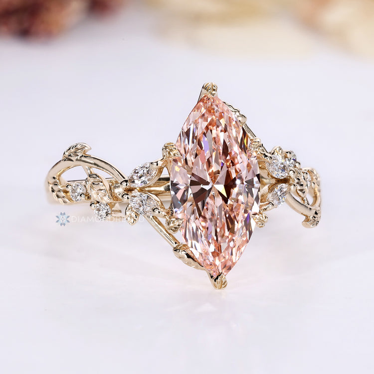 Pink marquise diamond ring with a tulip setting.