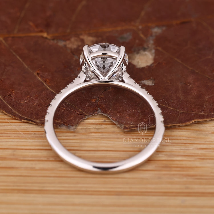 IGI certified Portuguese cut engagement ring with four claw prong.