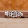 Vintage style Portuguese cut lab diamond ring with marquise and round side stones.