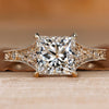 Art Deco engagement ring with a princess cut center stone.