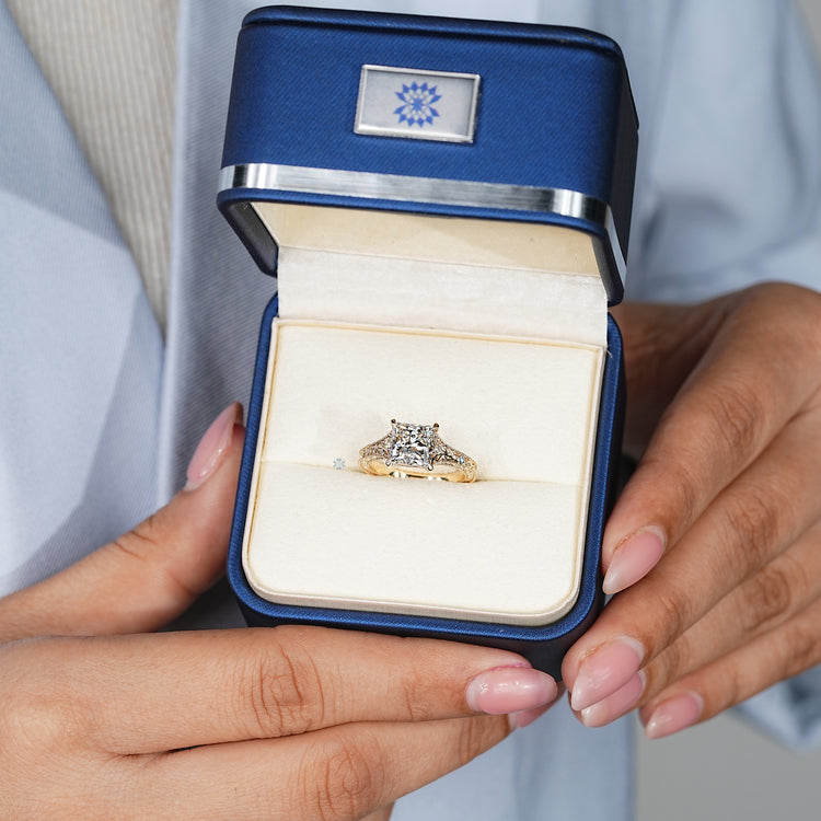 Vintage style Art Deco engagement ring with a princess cut.