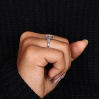 A sparkling pear diamond nestled in a V Prong Setting for a secure and elegant look.